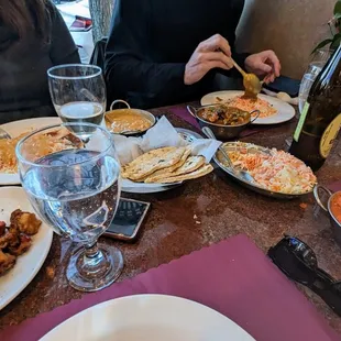 a table full of food and drinks