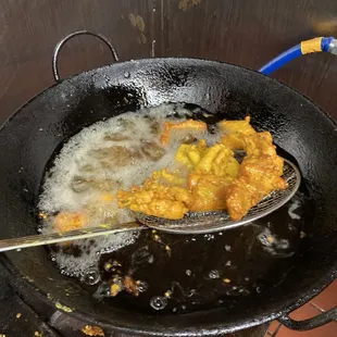 frying food in a frying pan