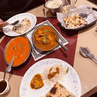 a table full of indian food