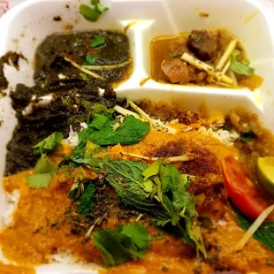 This moved around a bit on my walk, but lunch special with Chicken Tikka Masala, Mutton Karahi, and Palak Paneer with basmati rice. $7.99