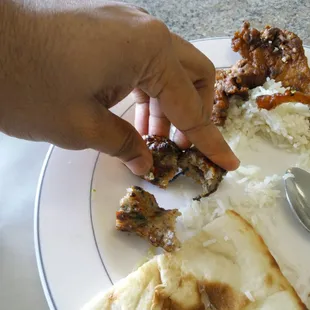 Found a rubber band inside the chicken sheekh kebab from the lunch buffet menu.