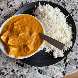 a bowl of curry and rice