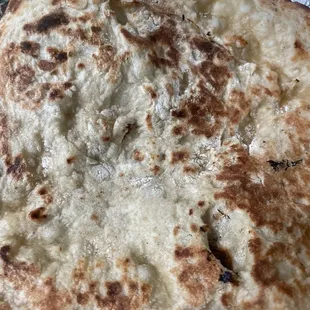 Dry naan after spending $50... what garlic? Don&apos;t waste your money. There are many better Indian restaurants in the area.