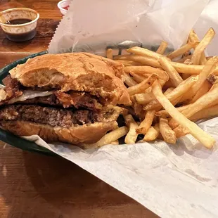 P&apos;unk Burger with basket of Idaho potato fries with truffle oil on the fries so good