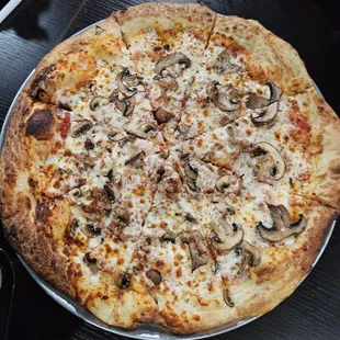 Mushroom and sausage pizza