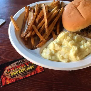 The smoked brisket platter with fries and potato salad