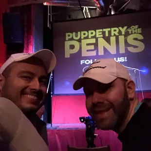 two men posing for a picture