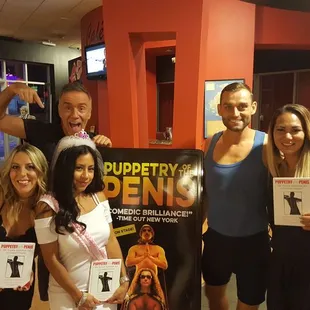 a group of people posing for a picture