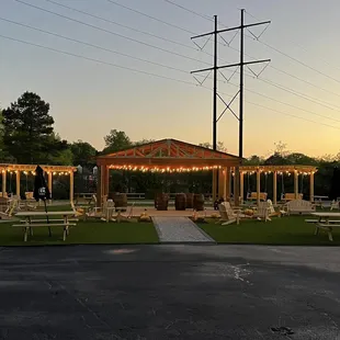 a gazebo and picnic tables