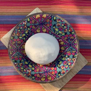 a ball of dough in a bowl