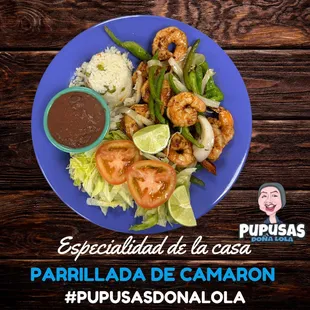 a plate of food with shrimp and rice