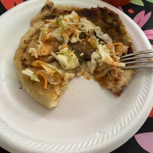 Revuelta Pupusa with Curtido and Salsa Roja .  So good!