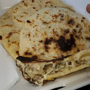 Asad and cheese papusa is bomb. Smells like heaven. I gott try the pork and cheese