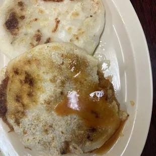 Mix Pupusa and a loroco with cheese made with rice dough.