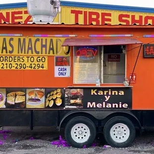 a food truck parked in front of a building