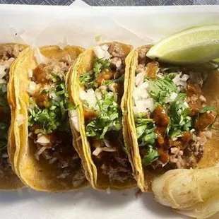 three tacos on a plate