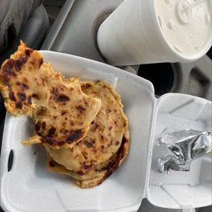 a plate of food and a drink