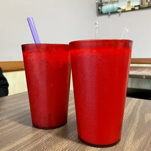 wo red cups on a table
