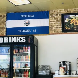 El Salvador flag is part of their signage.