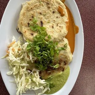 Pupusas with very spicy sauces.