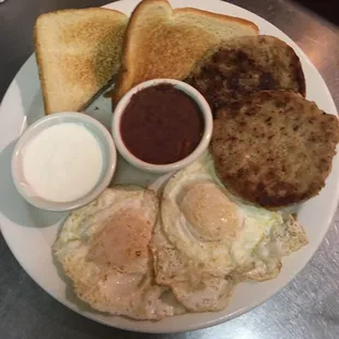 Sausage platter with beans and crema