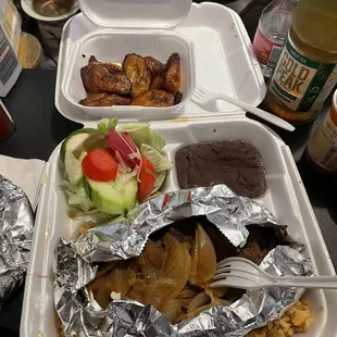 Beefsteak and onions. The fried plantains are the best ever yummie
