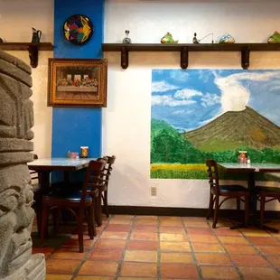 Dining room decor ranges from DaVinci to Aztec