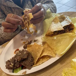 this is the type of meat you receive what is this big pieces of meat it took the whole burrito space it looked like pieces of burgermeat