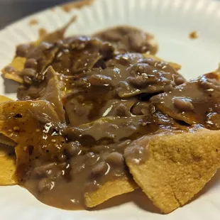 Instead of chips and salsa they give you chips with beans and salsa on it while you wait for your food Really good and very tasty!