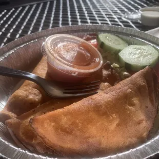 Pastelitos: beef, cabbage salad (curtido).