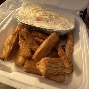 a meal in a styrofoam container