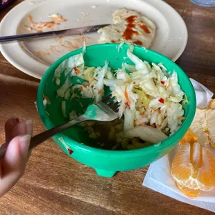 a person eating a bowl of food