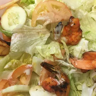 Salad with shrimp -- tons of radishes and onions, which I removed; browning iceberg lettuce; pale unripe tomatoes; 6 small shrimp.  Yuck!