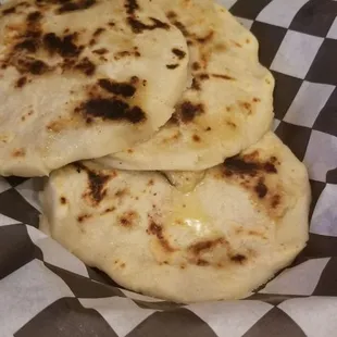 Pupusa party. My girls each ate one. Made with pork and cheese.