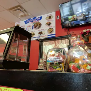 Inside. Ordering counter and window to kitchen.