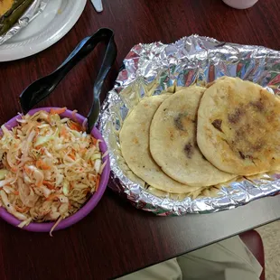 Three pupusas for $6. They have cheese, pork, and bean fillings.