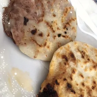 2 Pupusas  de arroz- 1 cheese and beans and 1 revuelta (pork)