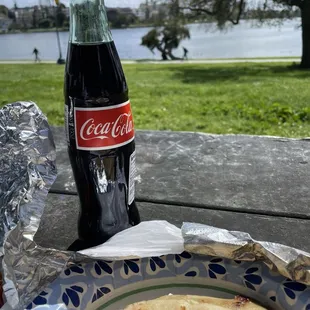 3 Pupusas and a coke. A beautiful day to eat lunch by the Lake. I didn&apos;t take a full picture because I had already dug in.