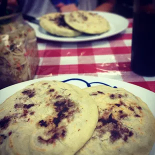 Two pupusas with generous helpings of cortido (slaw) was enough for a very filling $5 meal.