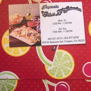 a business card with a picture of a slice of pizza