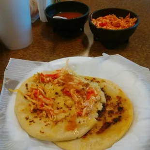 a tortilla on a paper plate