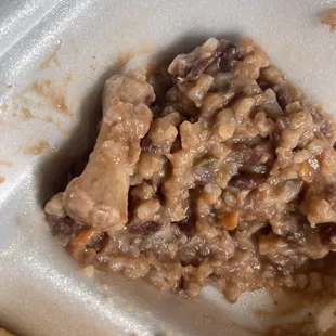 The piece of bone on the left side. My fork felt something hard and picked it out. smh.