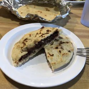 Pupusa de frijoles (bean pupusa). Not pictured is the cabbage and sauces they serve with it.