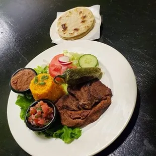 Carne Asada Rice. Salad. Grilled jalapeno &amp; onions. pico de gallo. beans. &amp; tortillas