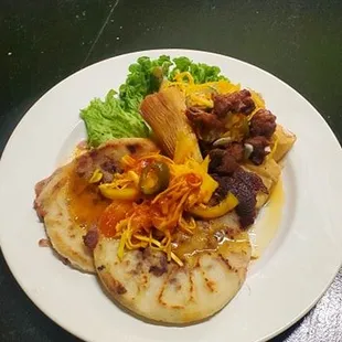Combo #1  Yuca fritta. Cassava fried. With chicharron and 2 pupusas and a soda can
