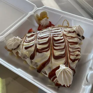 a dessert in a styrofoam container