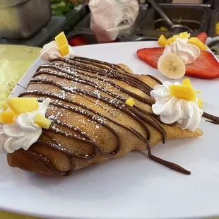 Nutella with peach, banana and strawberry