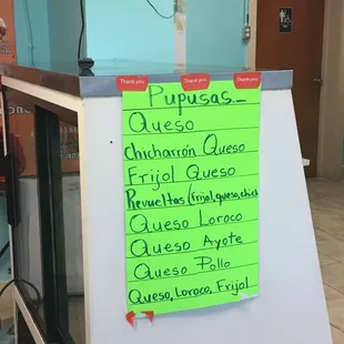 a menu on a refrigerator