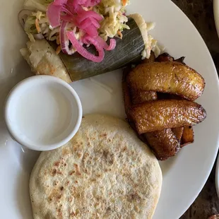 ##6. One Pupusa, Sour Cream, and Chicken Tamale Lunch Special