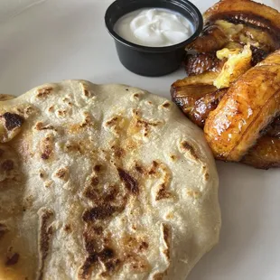 #8. One Pupusa, Plantain with Sour Cream and Small Avocado Salad Lunch Special